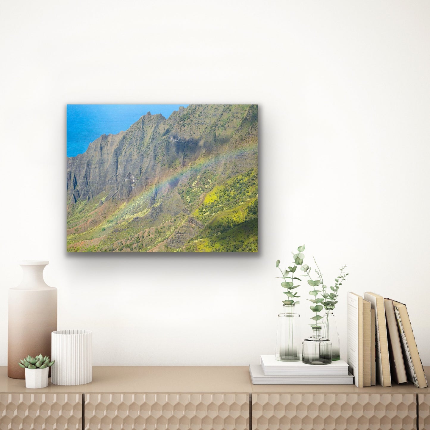 Wall demo of Rainbow Wall, a fine art landscape photograph on Kauai by outdoor photographers Inspiring Images Hawaii.