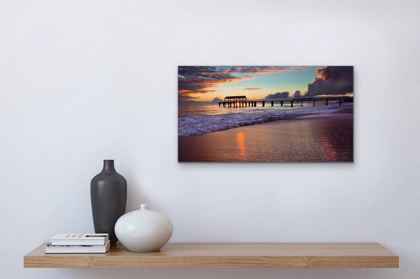 Wall demo of Waimea Pier Sunset, a fine art landscape photograph by Kauai outdoor and nature photographers Inspiring Images Hawaii.