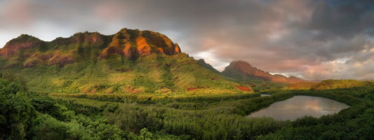 Fine art photograph of Kauai’s Menehune Fish Pond. The ancient fish pond and stream are surrounded by mangrove trees, with mountain range in the background. Landscape photography by Inspiring Images Hawaii.