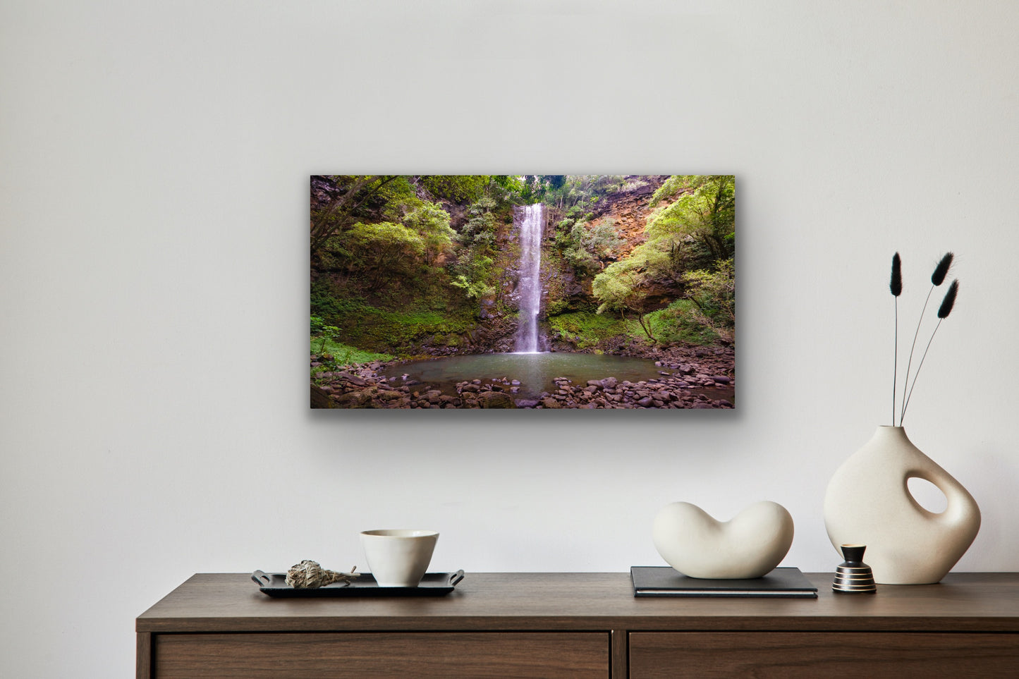 Wall demo of Secret Falls, a scenic fine art photograph by Kauai outdoor and landscape photographers Inspiring Images Hawaii.