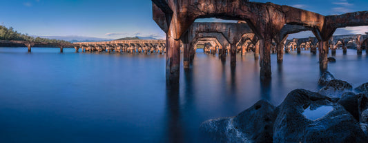 Color photo of the abandoned Ahukini Pier in Lihue, Kauai. Fine art photograph by Inspiring Images Hawaii Photography.