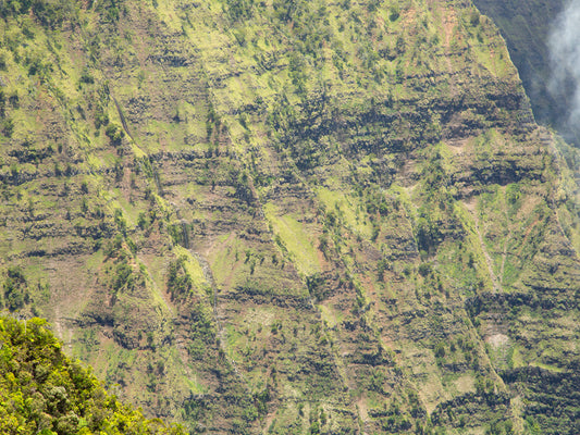 A close up photograph of one of Kalalau Valley’s cliffs, showing the texture and detail of the cliff’s terrain. Fine art photograph by Kauai landscape photographer Inspiring Images Hawaii.