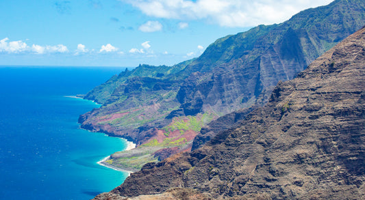 Fine art photograph taken from Nualolo ridge on Kauai’s Napali Coast. From this viewpoint you see the Napali Coastline from the side as it drops off into the bright blue ocean. Fine art photograph by Kauai landscape photographer Inspiring Images Hawaii.