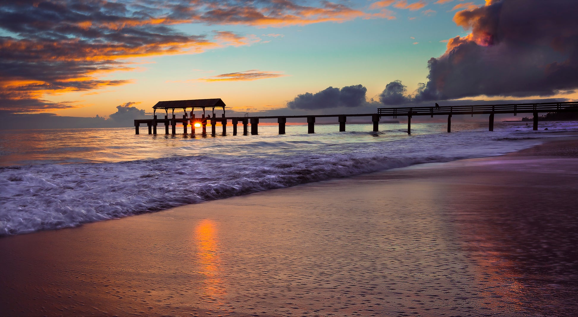 Fine art photograph of Kauai’s Waimea Pier during a brilliant sunset. Outdoor and nature photography by Inspiring Images Hawaii.
